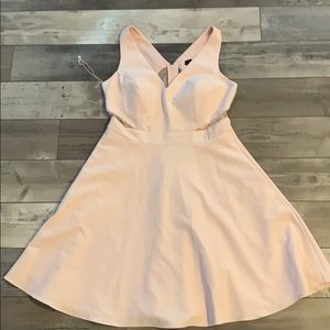 Pink dress with lace cutouts